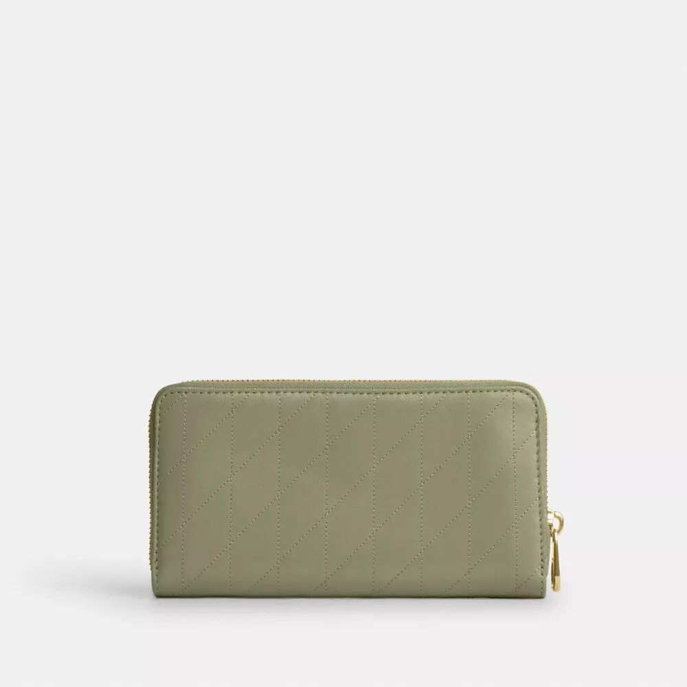 Cartera larga con cremallera alrededor y acolchado