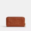 Cartera larga con cremallera alrededor y acolchado