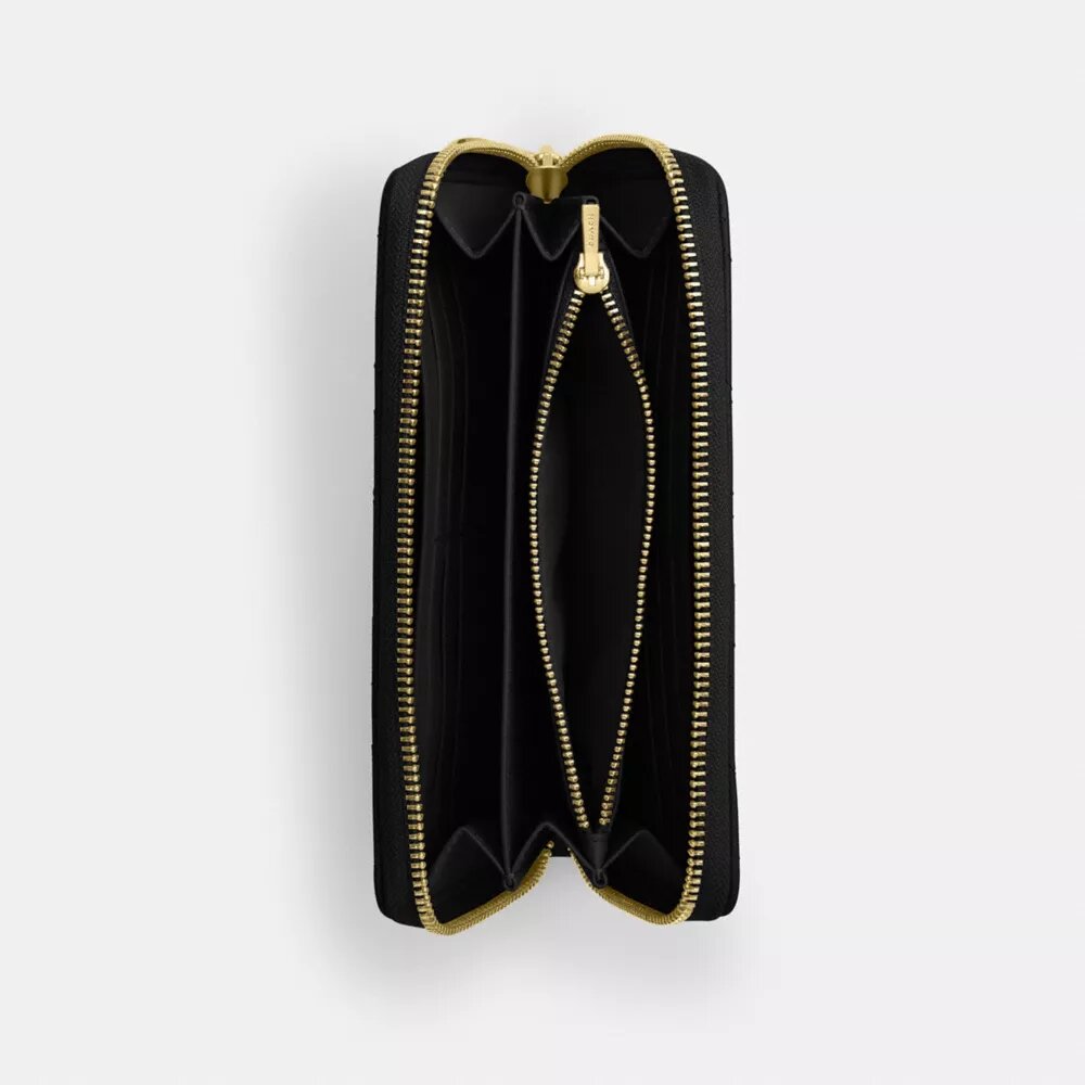Cartera larga con cremallera alrededor y acolchado