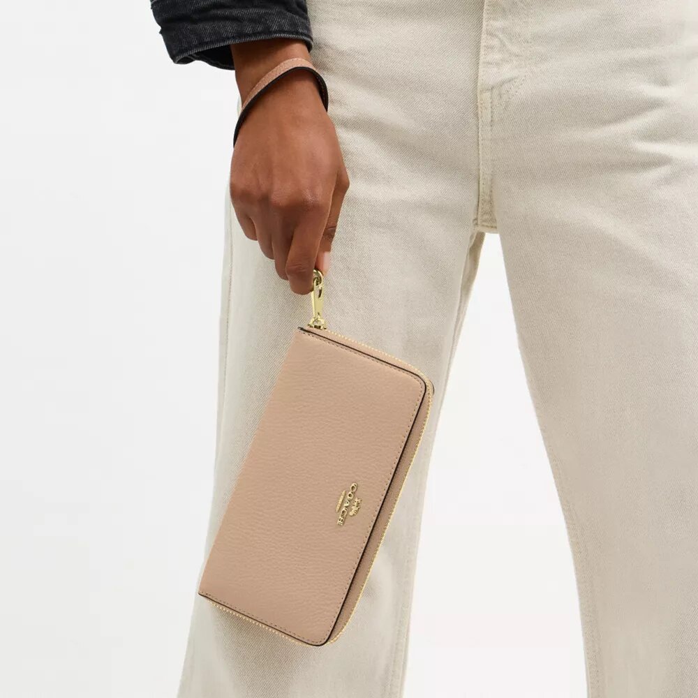 Cartera larga con cremallera envolvente