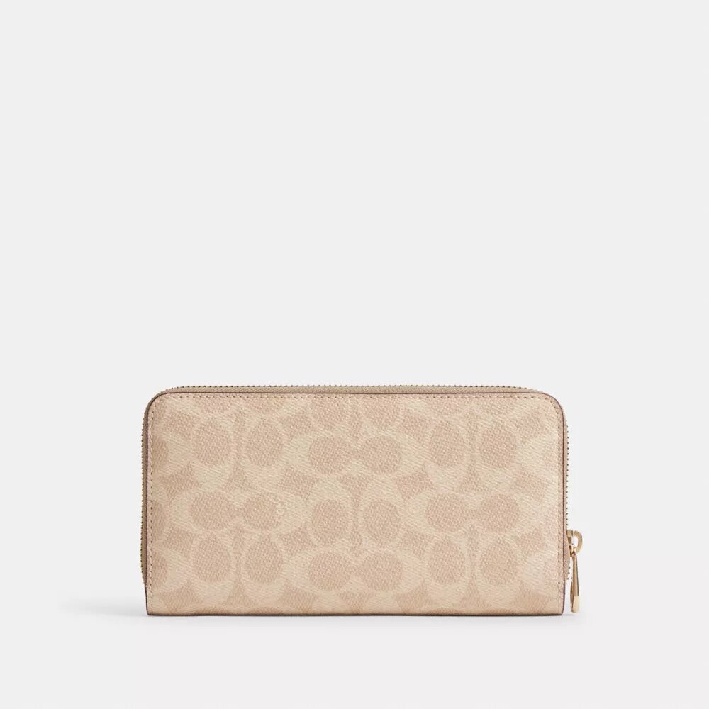 Cartera larga con cremallera perimetral en Signature Canvas