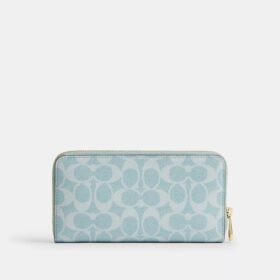 Cartera larga con cremallera perimetral en Signature Canvas