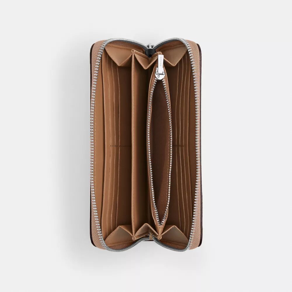 Cartera larga con cremallera perimetral en Signature Canvas