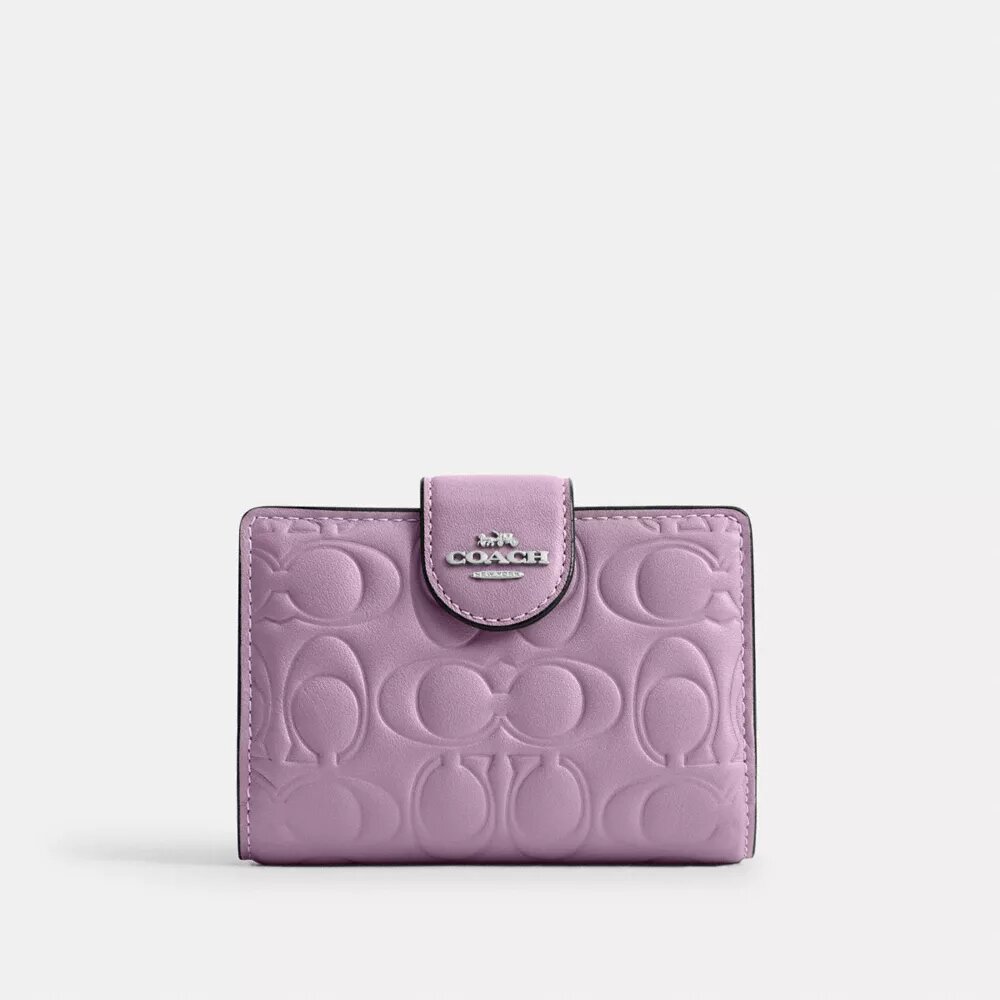 Cartera mediana con cremallera en esquina de cuero exclusivo