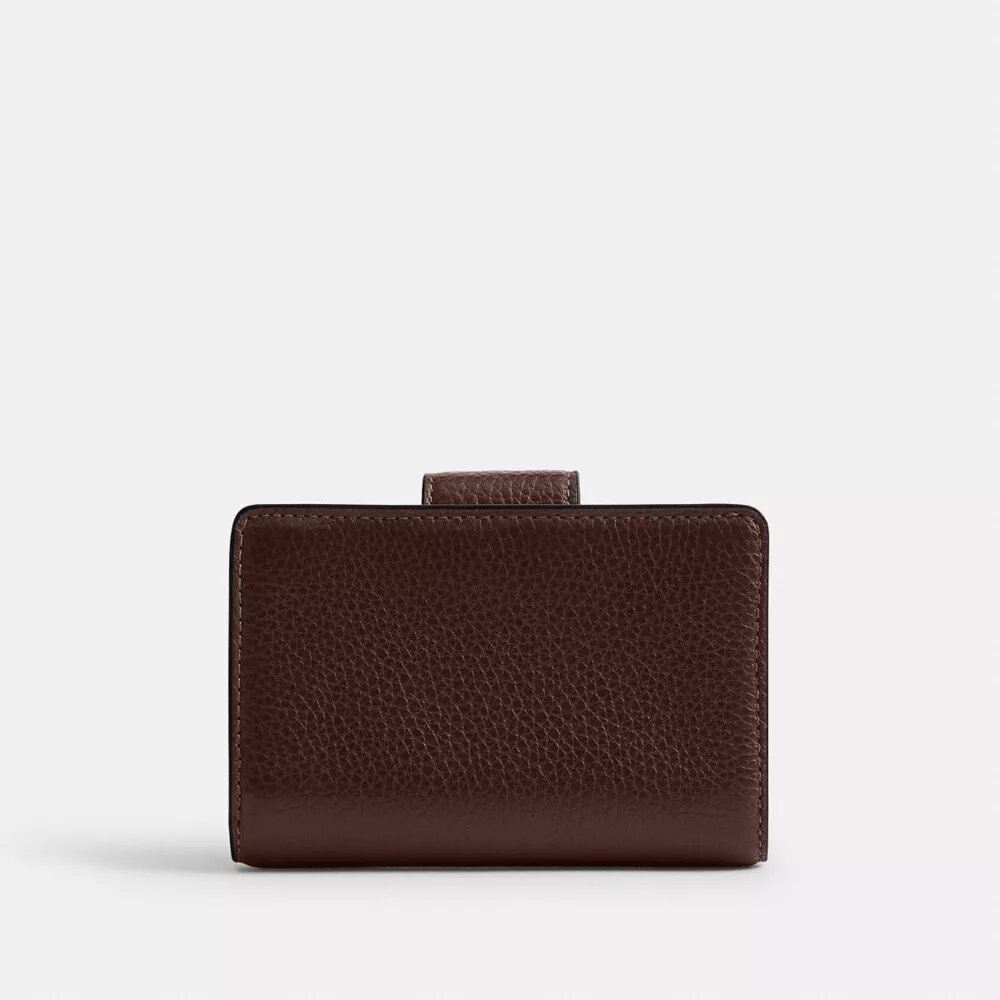 Cartera mediana con cremallera en la esquina