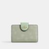 Cartera mediana con cremallera en la esquina y estampado floral