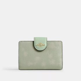 Cartera mediana con cremallera en la esquina y estampado floral