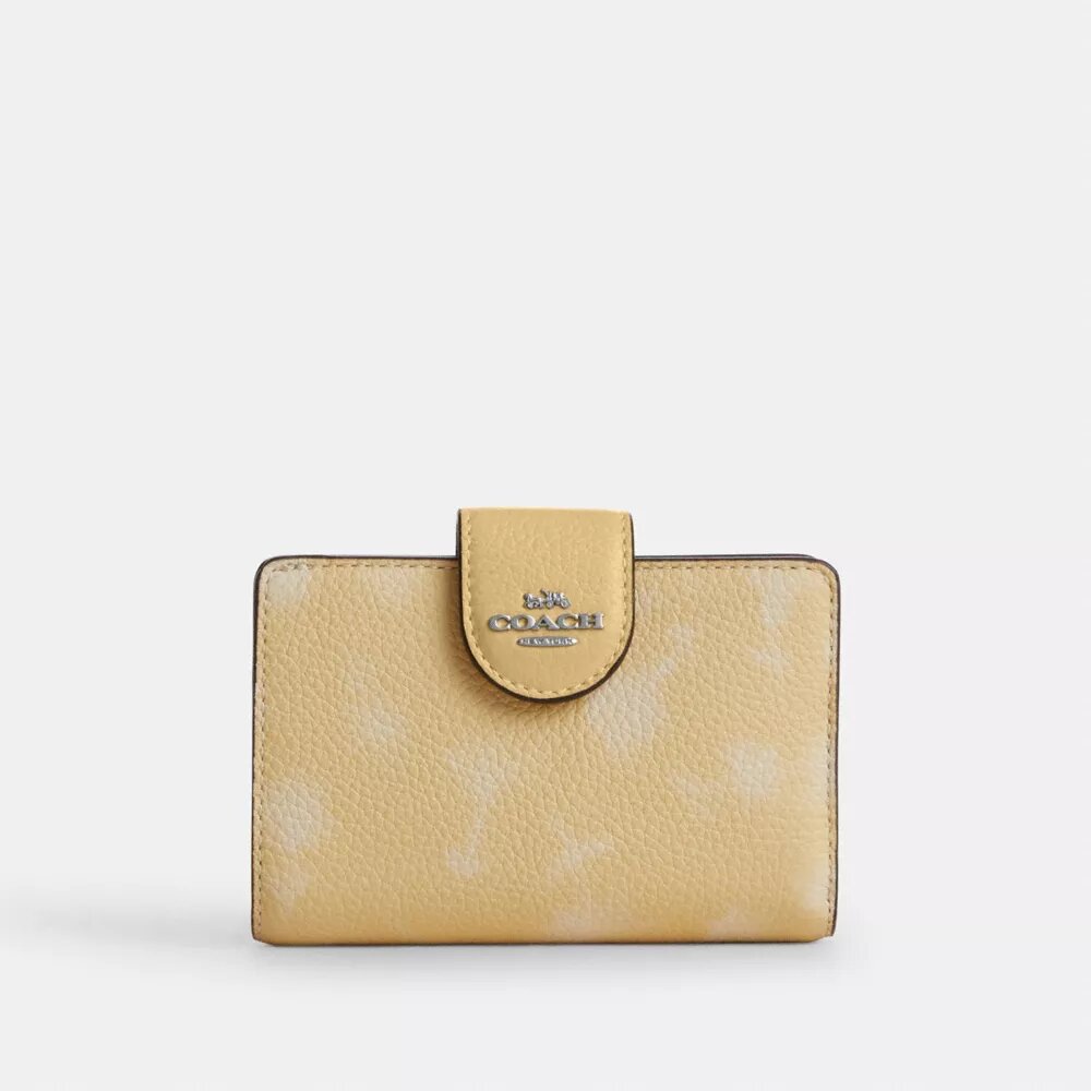Cartera mediana con cremallera en la esquina y estampado floral