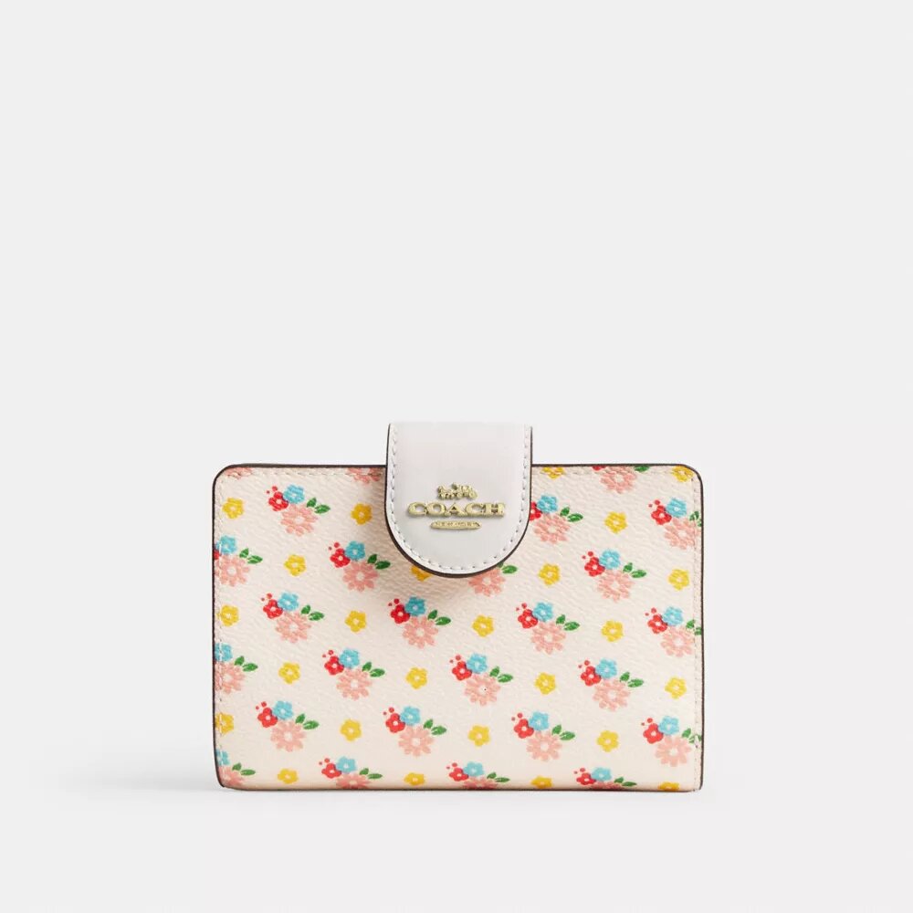 Cartera mediana con cremallera en la esquina y estampado floral