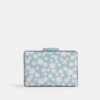 Cartera mediana con cremallera en la esquina y estampado floral