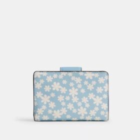 Cartera mediana con cremallera en la esquina y estampado floral