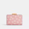 Cartera mediana con cremallera en la esquina y estampado floral
