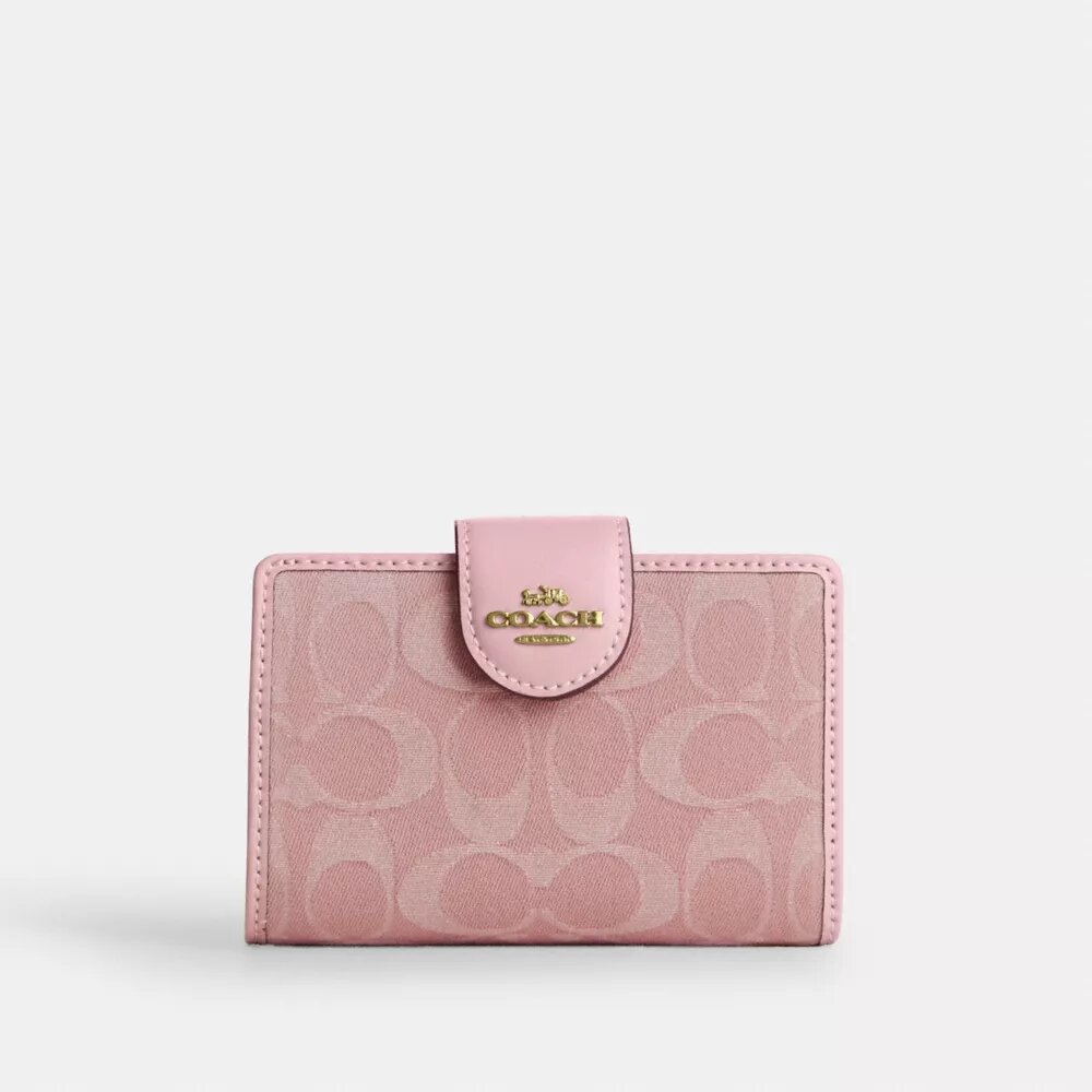 Cartera mediana con cremallera en las esquinas en denim exclusivo