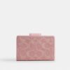 Cartera mediana con cremallera en las esquinas en denim exclusivo