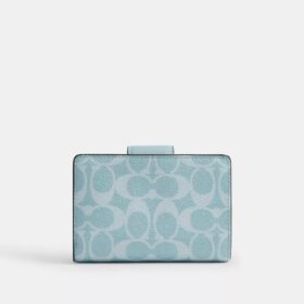 Cartera mediana con cremallera en las esquinas, en Signature Canvas