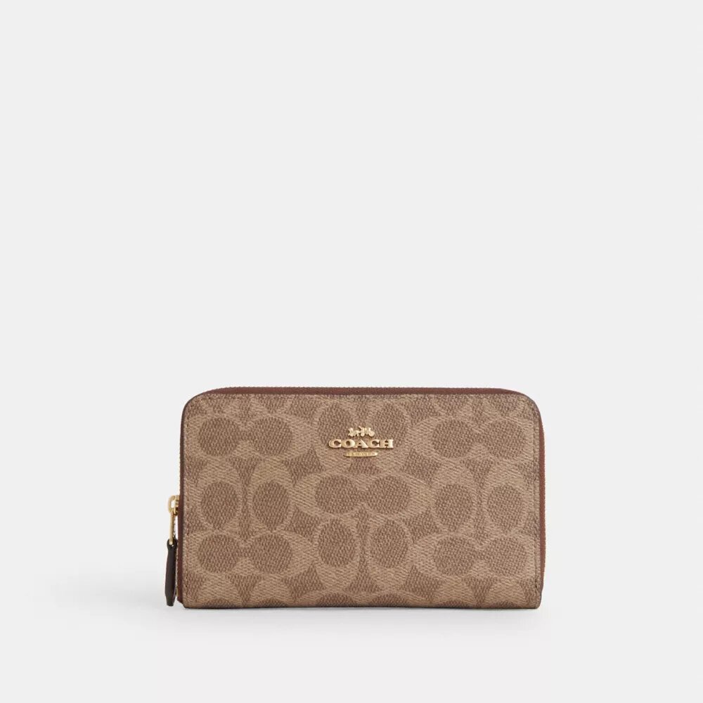 Cartera mediana con cremallera para identificaciones en Signature Canvas