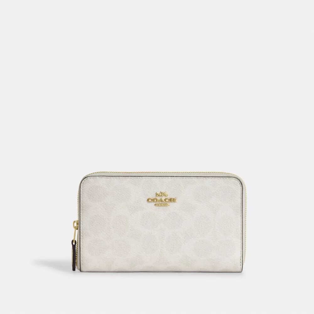 Cartera mediana con cremallera para identificaciones en Signature Canvas
