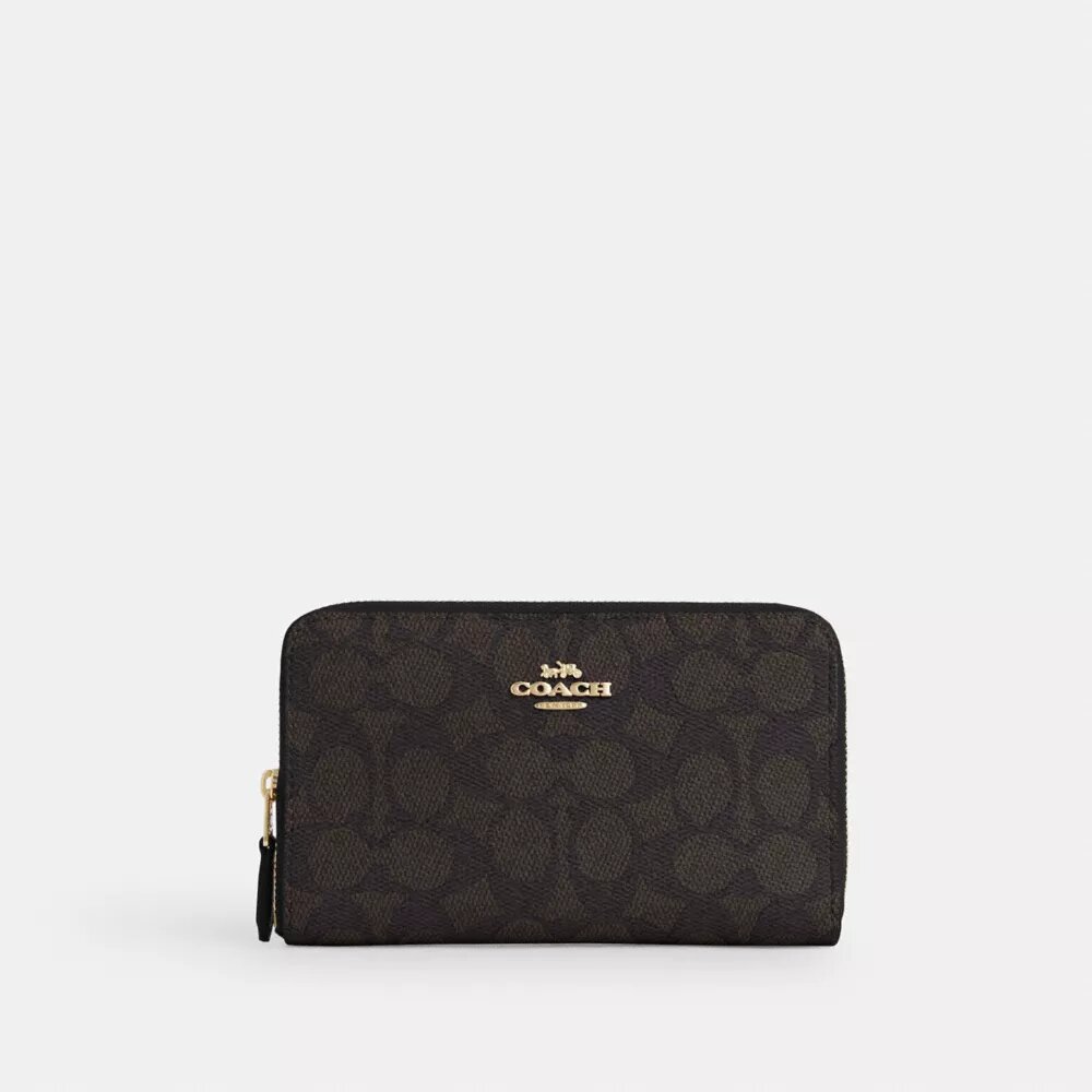 Cartera mediana con cremallera para identificaciones en Signature Canvas