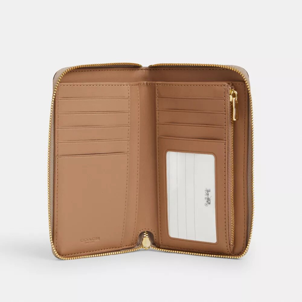 Cartera mediana con cremallera para identificaciones en Signature Canvas