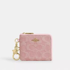 Cartera pequeña con cremallera en las esquinas, en denim exclusivo con Charms