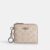 Cartera pequeña con cremallera en las esquinas, en Signature Canvas