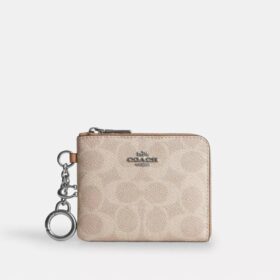 Cartera pequeña con cremallera en las esquinas, en Signature Canvas