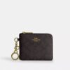 Cartera pequeña con cremallera en las esquinas, en Signature Canvas