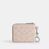 Cartera pequeña con cremallera en las esquinas, en Signature Canvas