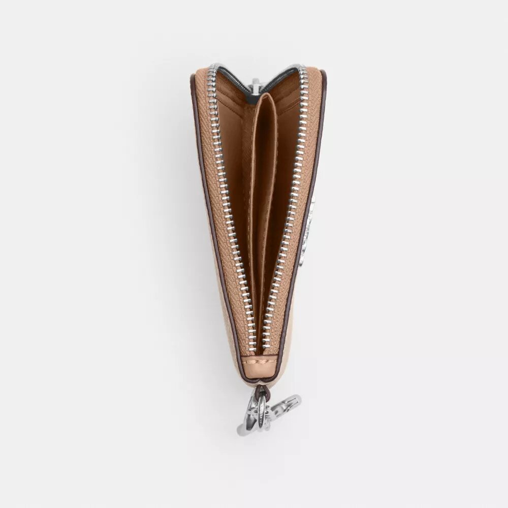 Cartera pequeña con cremallera en las esquinas, en Signature Canvas