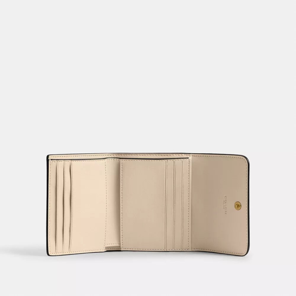 Cartera pequeña con solapa Mila en color block