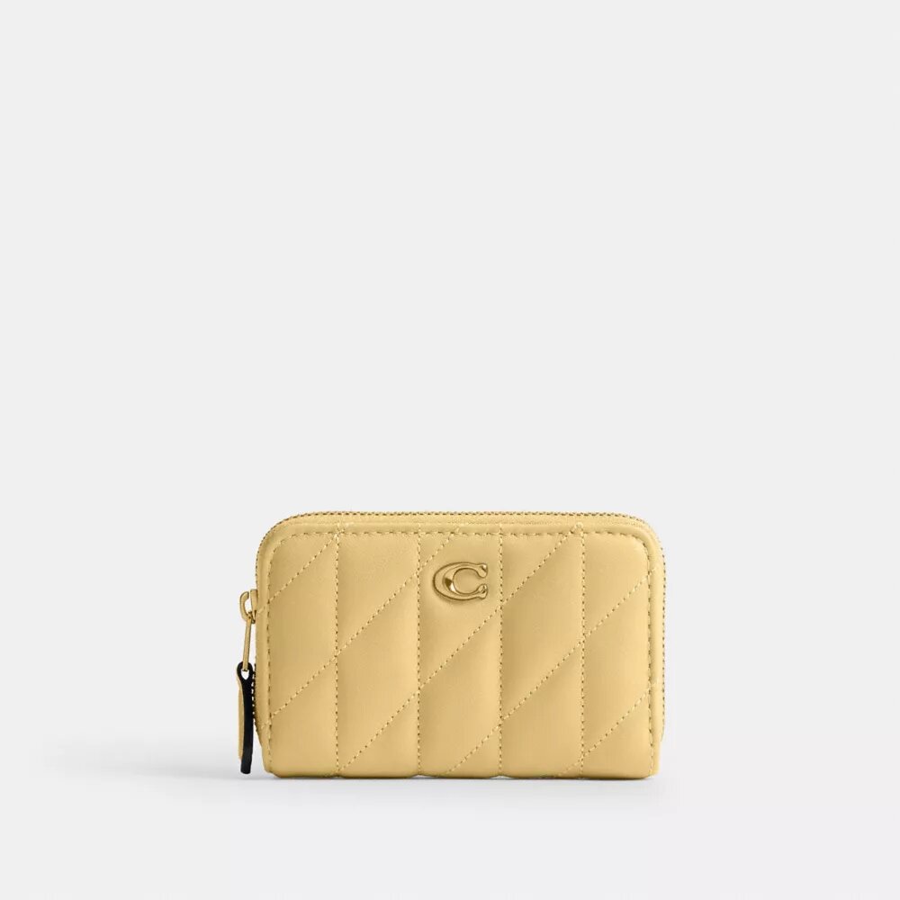 Cartera pequeña esencial con cierre de cremallera y acolchado tipo almohada
