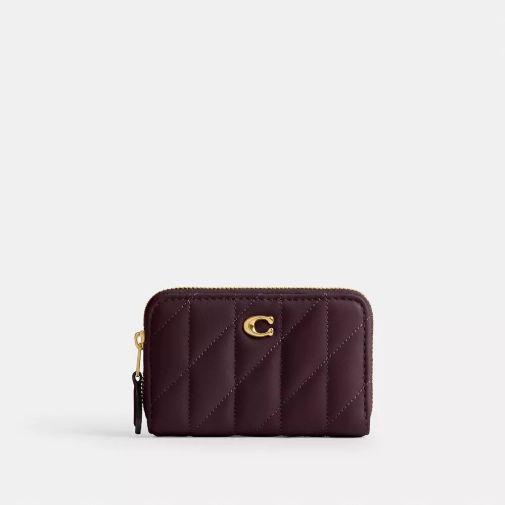 Cartera pequeña esencial con cierre de cremallera y acolchado tipo almohada