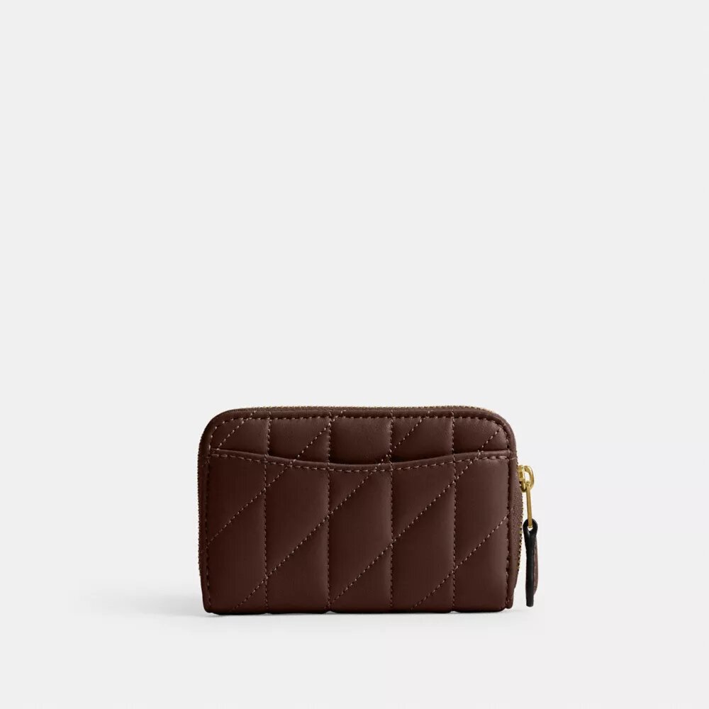 Cartera pequeña esencial con cierre de cremallera y acolchado tipo almohada