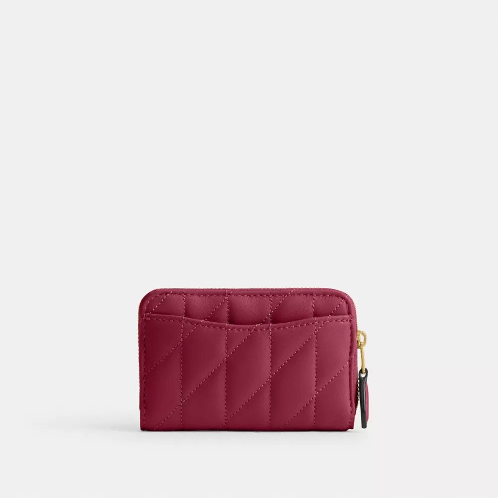 Cartera pequeña esencial con cierre de cremallera y acolchado tipo almohada