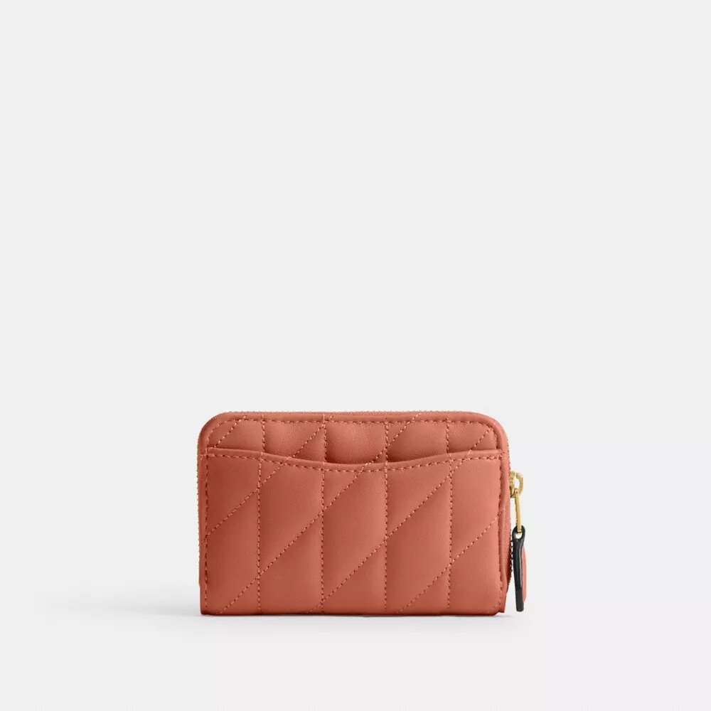 Cartera pequeña esencial con cierre de cremallera y acolchado tipo almohada