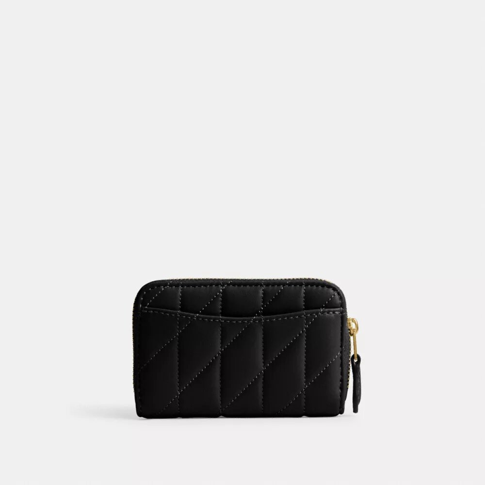 Cartera pequeña esencial con cierre de cremallera y acolchado tipo almohada