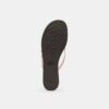Chanclas con lazo en jacquard exclusivo