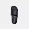 Chanclas deportivas Udele en Signature Canvas