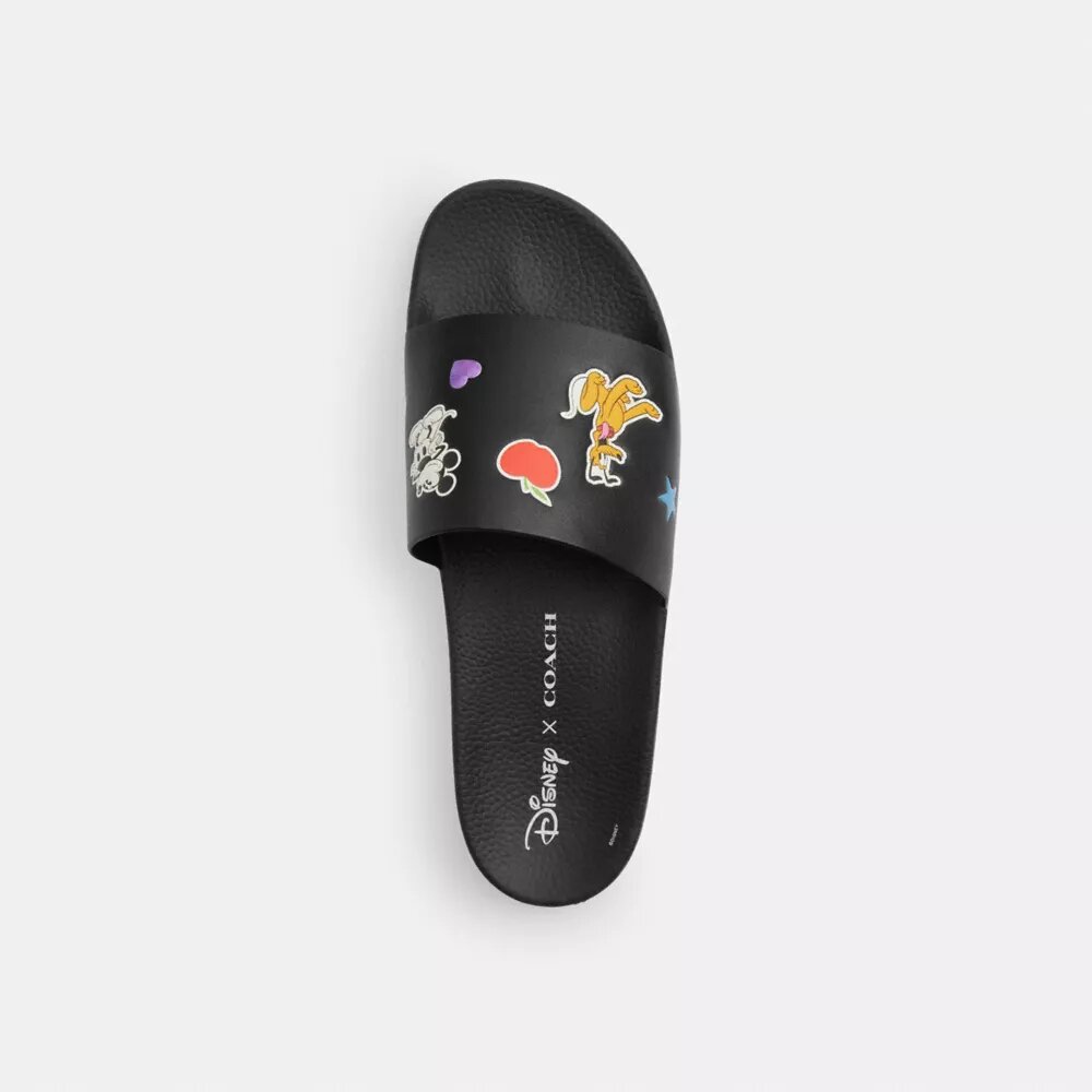 Chanclas Disney X Coach sin cordones con estampado de calcomanías