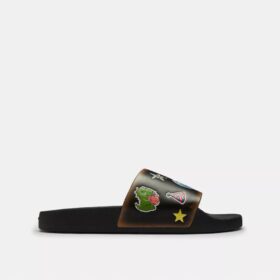 Chanclas sin cordones «Rexy 10.º cumpleaños» con estampado de calcomanías