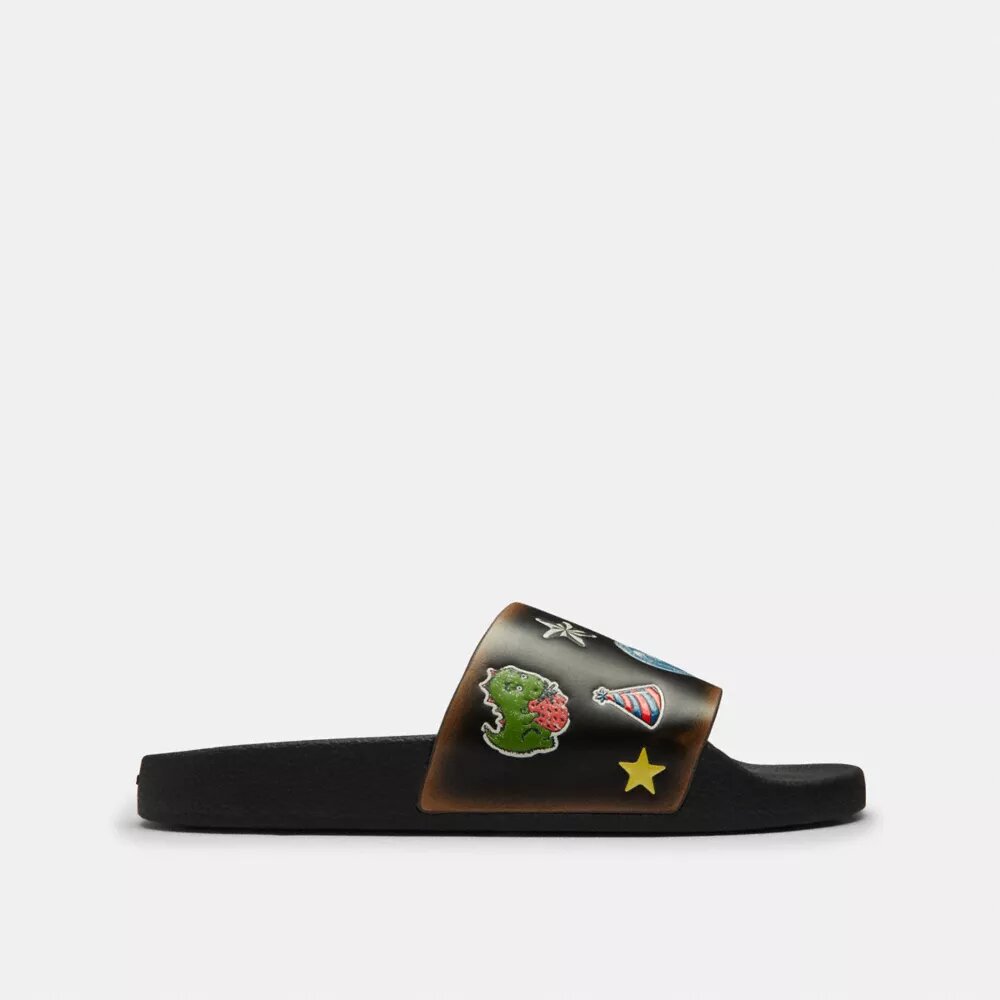 Chanclas sin cordones «Rexy 10.º cumpleaños» con estampado de calcomanías