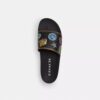 Chanclas sin cordones «Rexy 10.º cumpleaños» con estampado de calcomanías