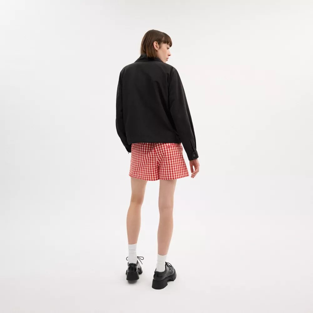 Chaqueta corta tipo cargo con presillas de Coachtopia