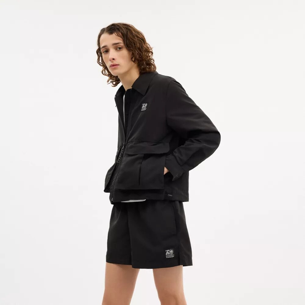 Chaqueta corta tipo cargo con presillas de Coachtopia