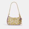 Colgante para bolsos con cierre de resorte y estampado floral