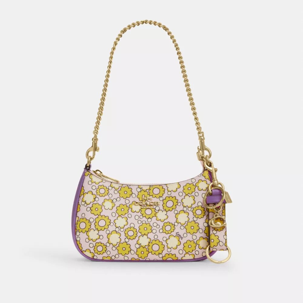 Colgante para bolsos con cierre de resorte y estampado floral