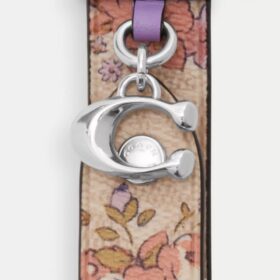 Colgante para bolsos con cierre de resorte y estampado floral