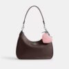 Colgante para bolsos en forma de corazón en cuero exclusivo con dije de corazón
