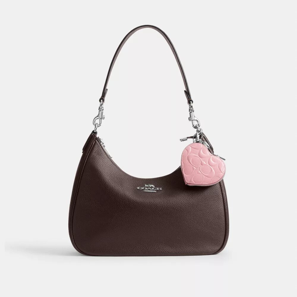 Colgante para bolsos en forma de corazón en cuero exclusivo con dije de corazón