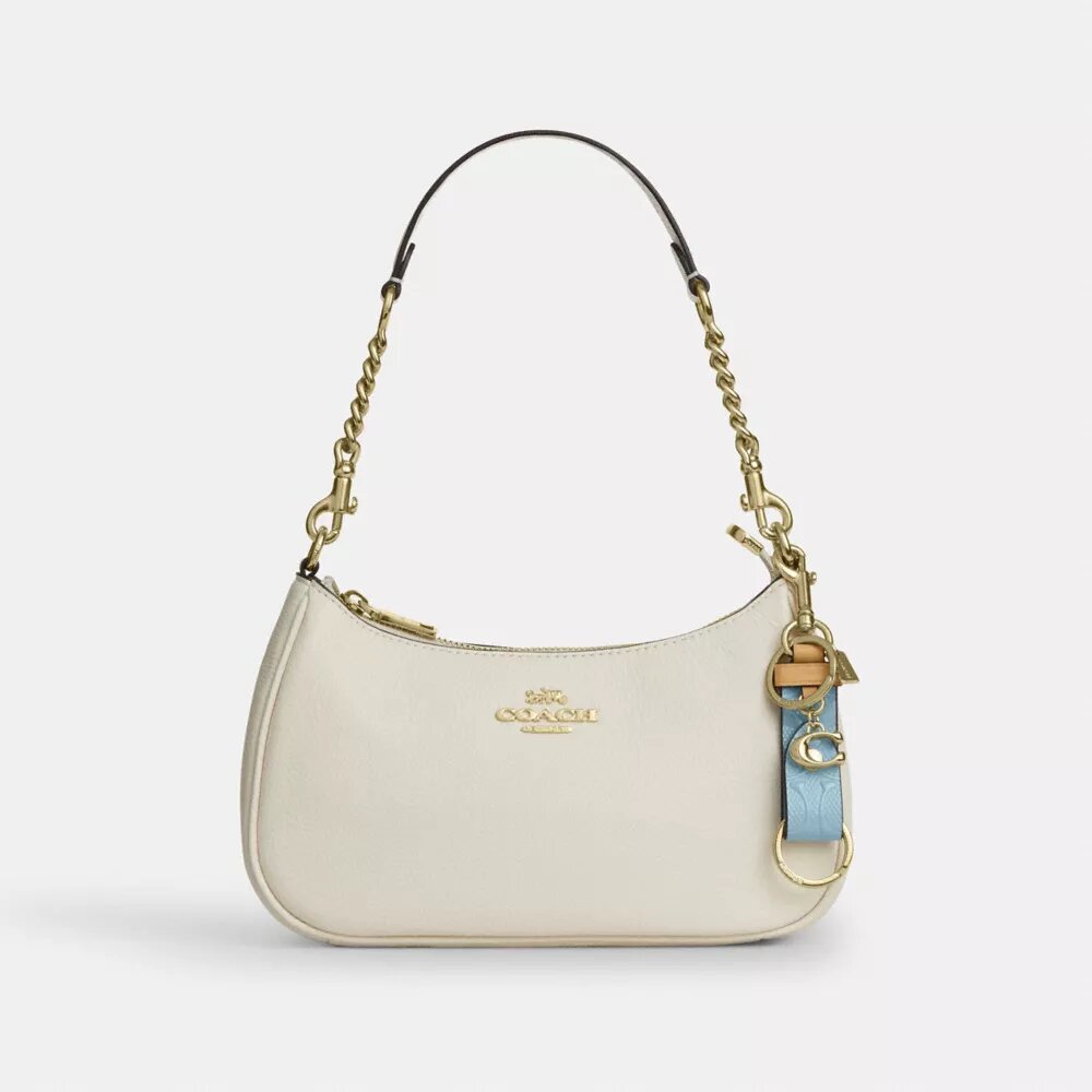 Colgante para bolsos «Trigger Snap» en cuero exclusivo con Charms